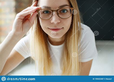 A Woman Has Vision Problems Squints When Trying To See Something