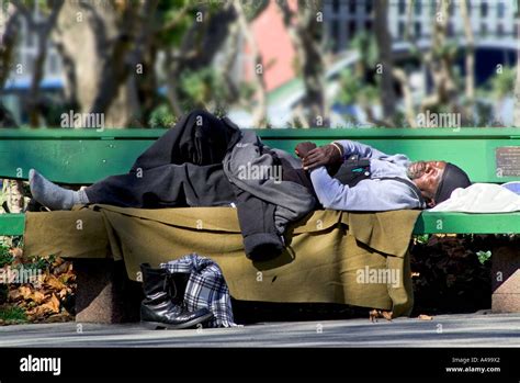 Homeless Person Black Man Sleeping Bench Hi Res Stock Photography And