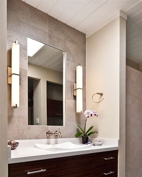Ideally, they should be 36″ to 40″ apart to ensure even lighting on the face. Metro Bath Details | Tech Lighting