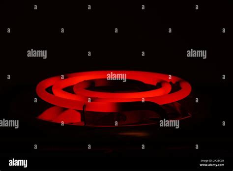 electric stove red spiral warming up Stock Photo - Alamy