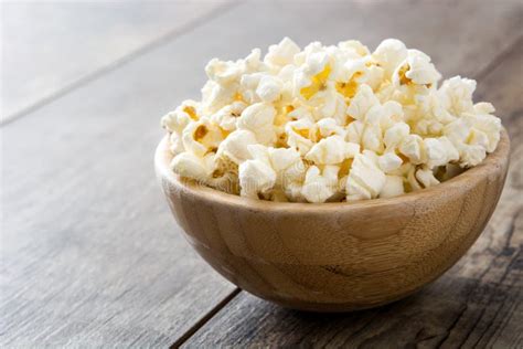 Popcorn In Bowl On Wooden Table Stock Image Image Of White Corn