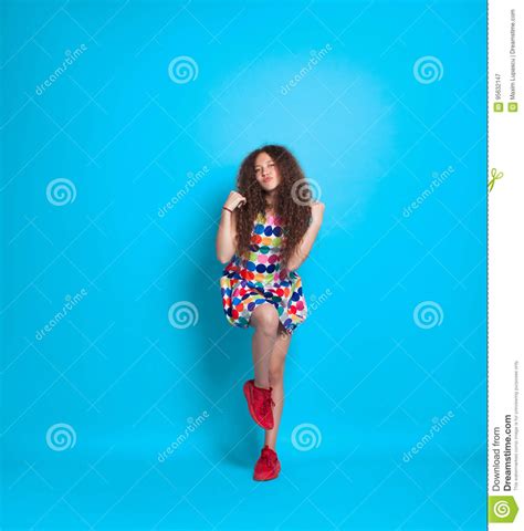 Girl With Curly Hair Posing In Studio Stock Image Image Of Leisure