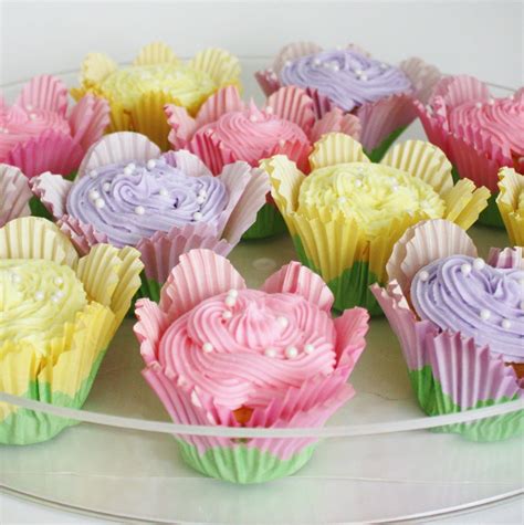 Tutorials for cupcake liner flowers. Matching the frosting to the flower cupcake liner color. I ...