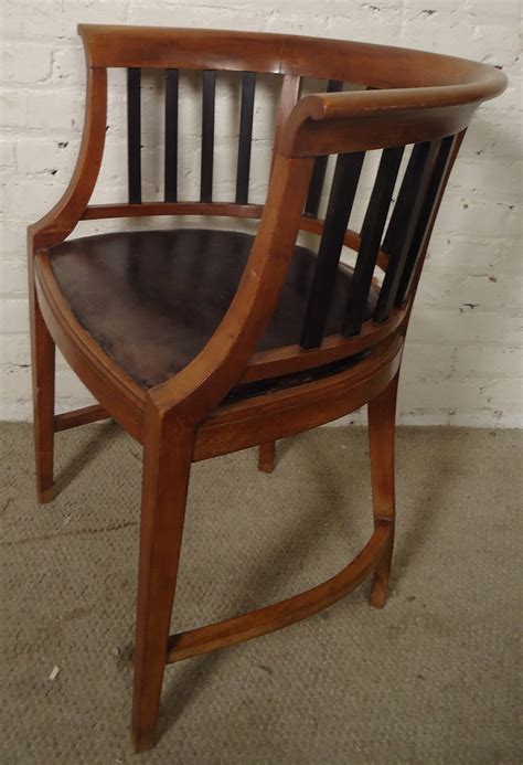 No need to register, buy now! Unique Vintage Round Back Spindle Chair at 1stdibs