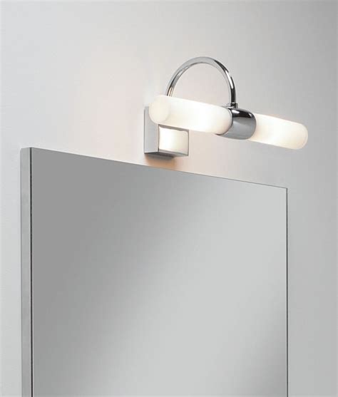 The standard height for vanity lighting above bathroom mirrors is 75 to 80 from the finished floor to the center of the light fixture. Bathroom Wall Light - Polished Chrome