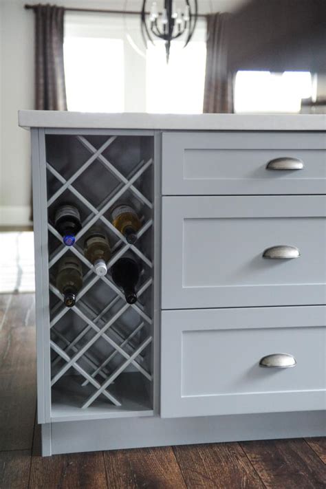 Wine cabinets have you covered at dinner parties. Farmhouse Kitchen With Wine Rack | HGTV