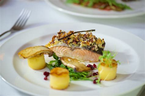 Smoked salmon salad is a colourful dish combining the crunch of black olives with the zest of fresh lemon juice. 32 at The Mansion offers simple fine dining experience - Kuali