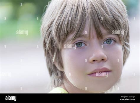 Portrait Of A Boy With A Striking Blue Eyes Stock Photo Alamy