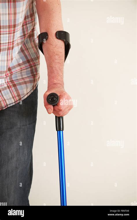 Close Up Of Man Using Crutches Stock Photo Alamy