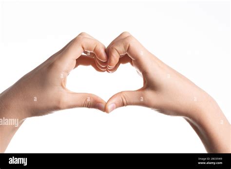 Kid Hands Forming A Heart Shape On White Background Stock Photo Alamy