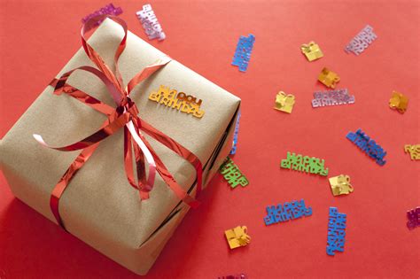 Maybe you would like to learn more about one of these? Free Stock Photo 11431 Birthday present on a red ...