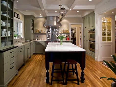 This is the ultimate kitchen island design ideas gallery showcasing 90 truly awesome but different kitchens island styles. Charming Mint Kitchen | Laura Dalzell | HGTV