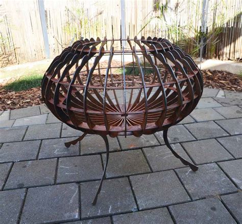 Relaxing in front of a backyard fire can be the perfect ending to a busy day.assuming the fire pit is safe! Georgia Morgan - Sea Urchin Fire Pit • JahRoc Galleries