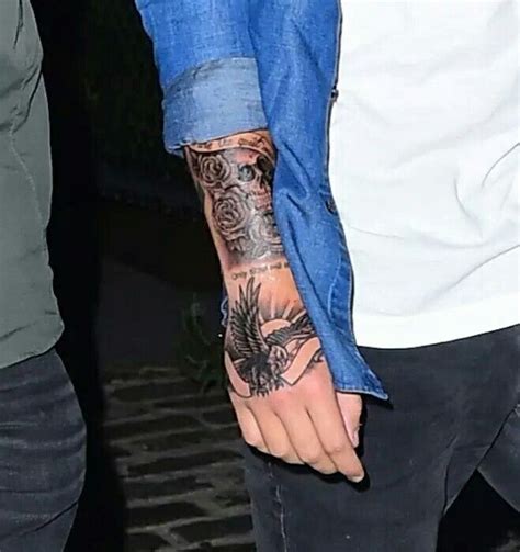 Liam payne debuts two new tattoos with one direction in. Liam tattoo | Liam payne, Tattoos, 1d and 5sos