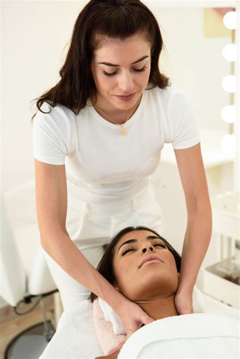 Woman Receiving Head Massage In Spa Wellness Center Stock Image