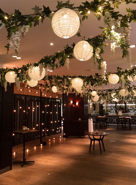 Festoon cascade plus wisteria and lantern ceiling canopy for a wedding
