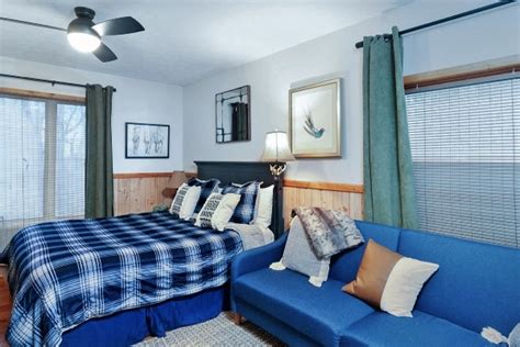 This beautiful main house has two separate living areas—each suite can sleep up to 6 people. Cave Run Cabins - Morehead, KY