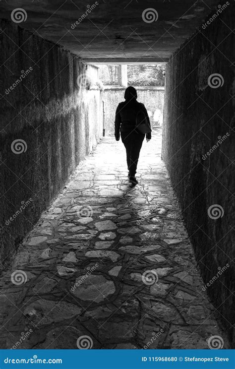 Walking In A Dark Tunnel Black And White Photo Stock Photo Image Of