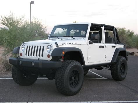 Send your jeep pictures and a brief description and we can post your jeep on this website! White JK w/ black rims that's what its gonna look like one ...