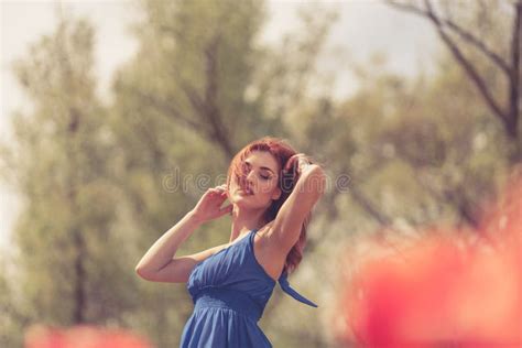 Sensual Woman In Red Flower Field In Sunny Day Stock Image Image Of