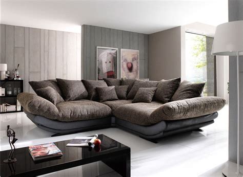 This suede sofa has sturdy exposed legs that add a bit of polish to the piece. New Century Comfy Sectional. | Large sectional sofa, Sectional sofa comfy, Couches living room
