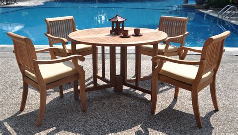 Modern teak sets have a teak outdoor bench on one side instead of chairs. WholesaleTeak 5 Piece Teak Dining Set with 48 Inch Folding Patio Table + Stacking Chairs - Patio ...