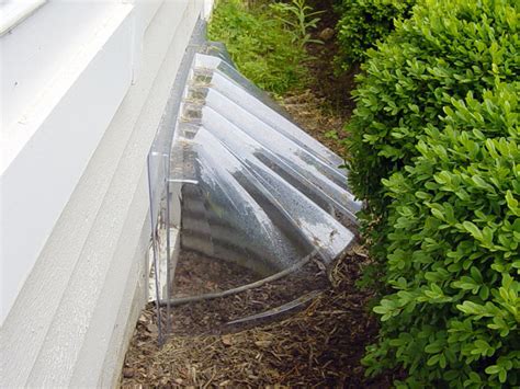 Custom window well covers are, in my opinion, the best option. SunHouse Basement Window Wells