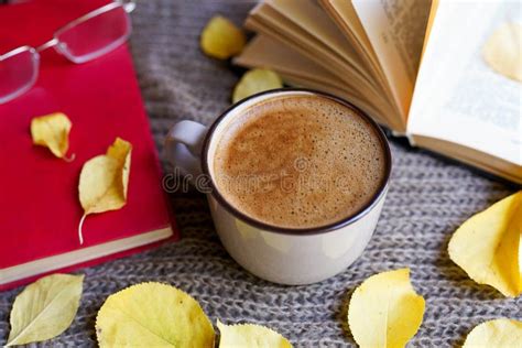 Autumn Flatlay With Cup Of Coffee Books Glasses Yellow Leaves And Books On Scarf Background