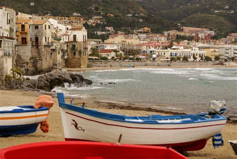 Sicilian Fishing Boat On The Beach In Cefalu Sicily Stock Photo