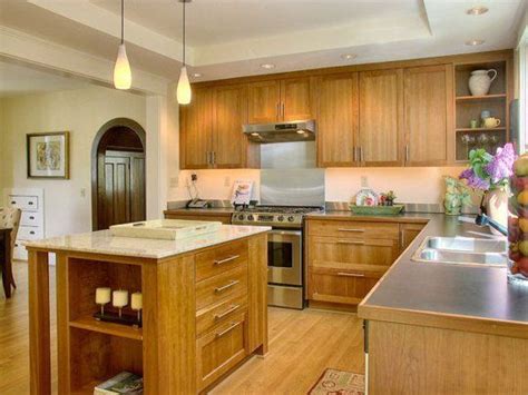 If the space above the kitchen cabinets is open you essentially have a high shelf that can be used to display decorative items or even to store items that. Mind the Gap: Fresh Ideas For Decorating the Kitchen ...