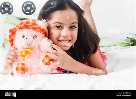 One Kid Girl Bedroom Lying Down Relaxation Toy Holding Stock Photo Alamy