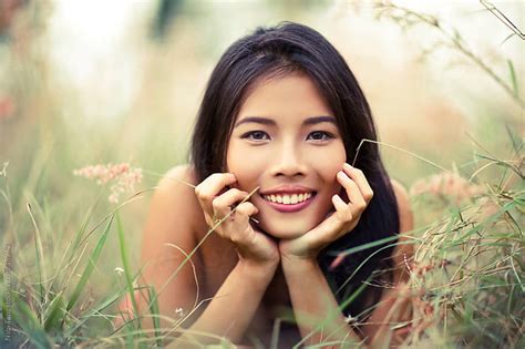 Cute Asian Woman Portrait Enjoying In The Nature By Nabi Tang Stocksy