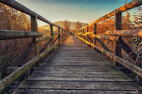 Little Wood Bridge Over The Lake High Quality Nature Stock Photos