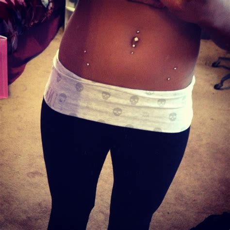 hip dermals and double belly button piercing piercing tattoo hip piercings skin piercing