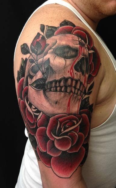 Skull With A Bullet Hole In Forehead And Red Roses Tattoo
