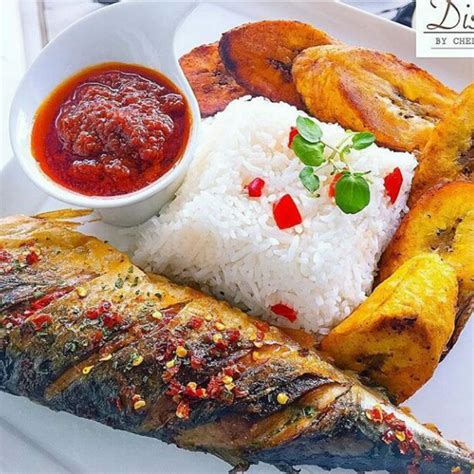 White Rice And Stew With Grilled Fish And Fried Plantain African