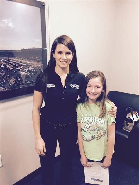 Danica patrick splits her driving time between the indycar racing series and the nascar nationwide series where she drives the no. "Meeting her hero" This little girl gets a picture with ...