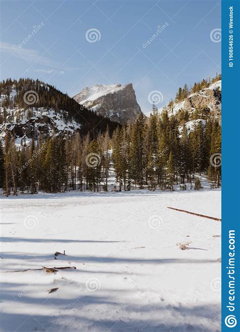 Vertical Image Of The Frozen Alpine Emerald Lake At Rocky Mountain