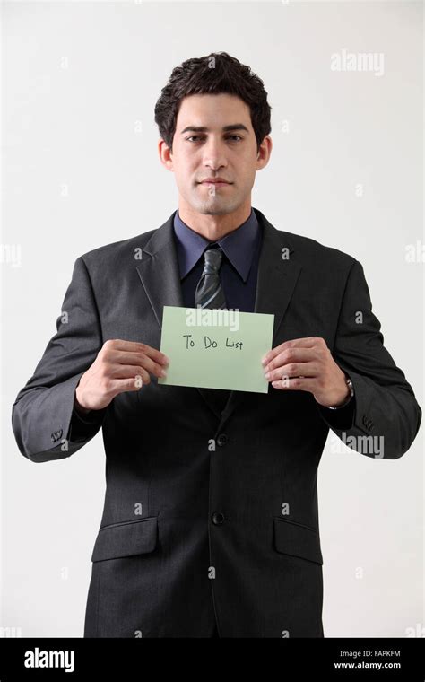 Businessman Holding Message Card Portrait Stock Photo Alamy