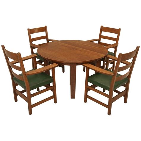 A warm brown finish outfits the rectangular top for a natural touch, while the base sports a white finish for a subtle contrast. Arts and Craft Dining Table and Chairs in Original ...