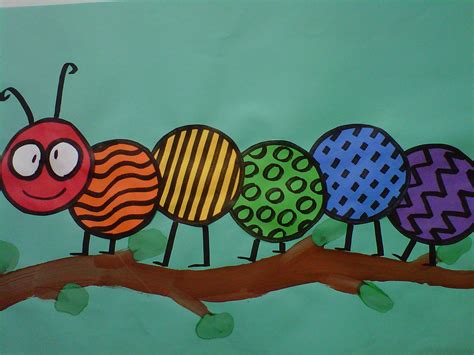 The Very Colorful Caterpillars Are On The Tree Branch Painted With