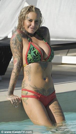 Jemma Lucy Flaunts Her Ample Assets And Tattoos In Tiny Print Bikini In