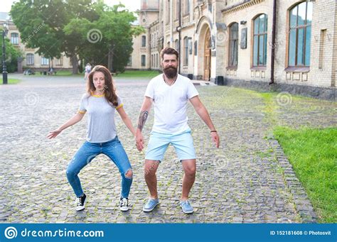 going crazy together woman and bearded man in crazy mood dancing outdoor couple crazy in love