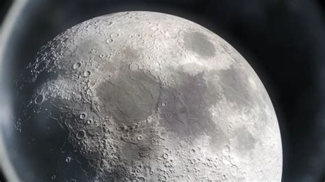 The first uncrewed mission to the moon was in 1959 by the soviet lunar program with the first crewed landing being apollo 11 in 1969. Highly detailed Moon seen from Telescope in Multiple Views