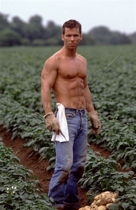 Shirtless Muscular Farm Worker In A Potato Field Rob Lang Images
