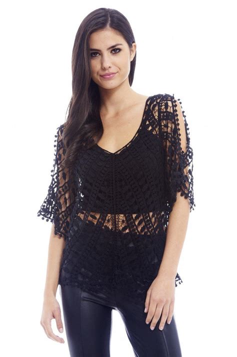 The back of the project features a large lacy floral block, and the front features a series of smaller lace blocks. BLACK CROCHET TOP | Black crochet top, Black crochet ...