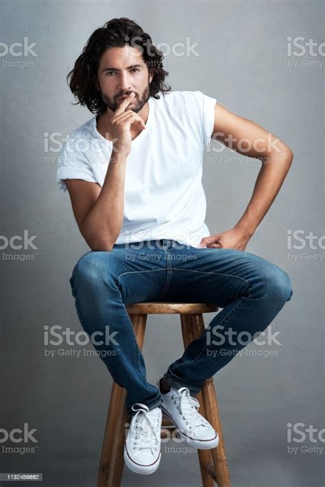 Classic Brooding Good Looks Stock Photo Download Image Now Stool