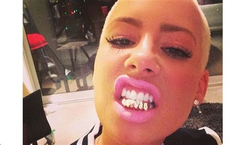 Amber Rose Unveils New Gold Grillz On Her Teeth Amber Rose Grillz