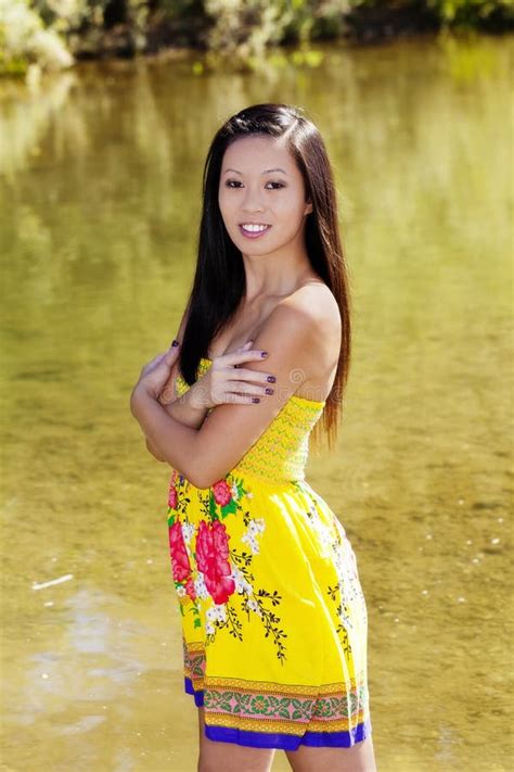 Smiling Skinny Asian American Woman Undressing Outdoors Stock Image Image Of Lady Outdoors