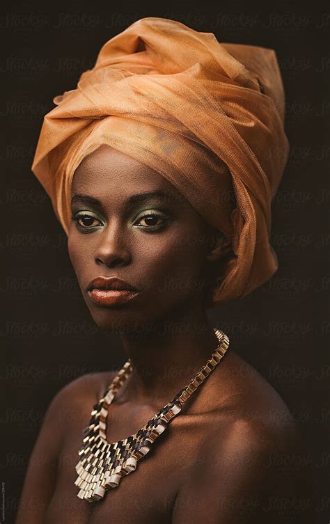 African Woman With An Orange Turban By Stocksy Contributor Lumina
